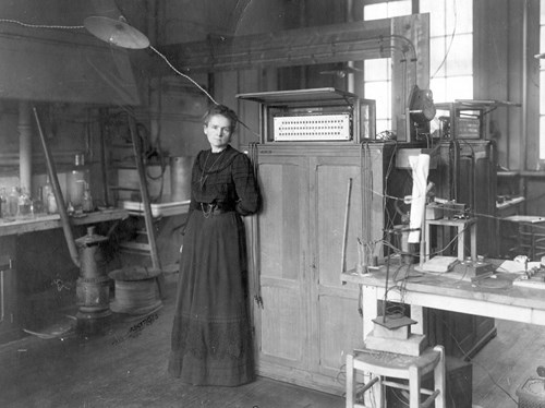 Marie Skłodowska-Curie in the laboratory, 1912, Wikipedia Commons